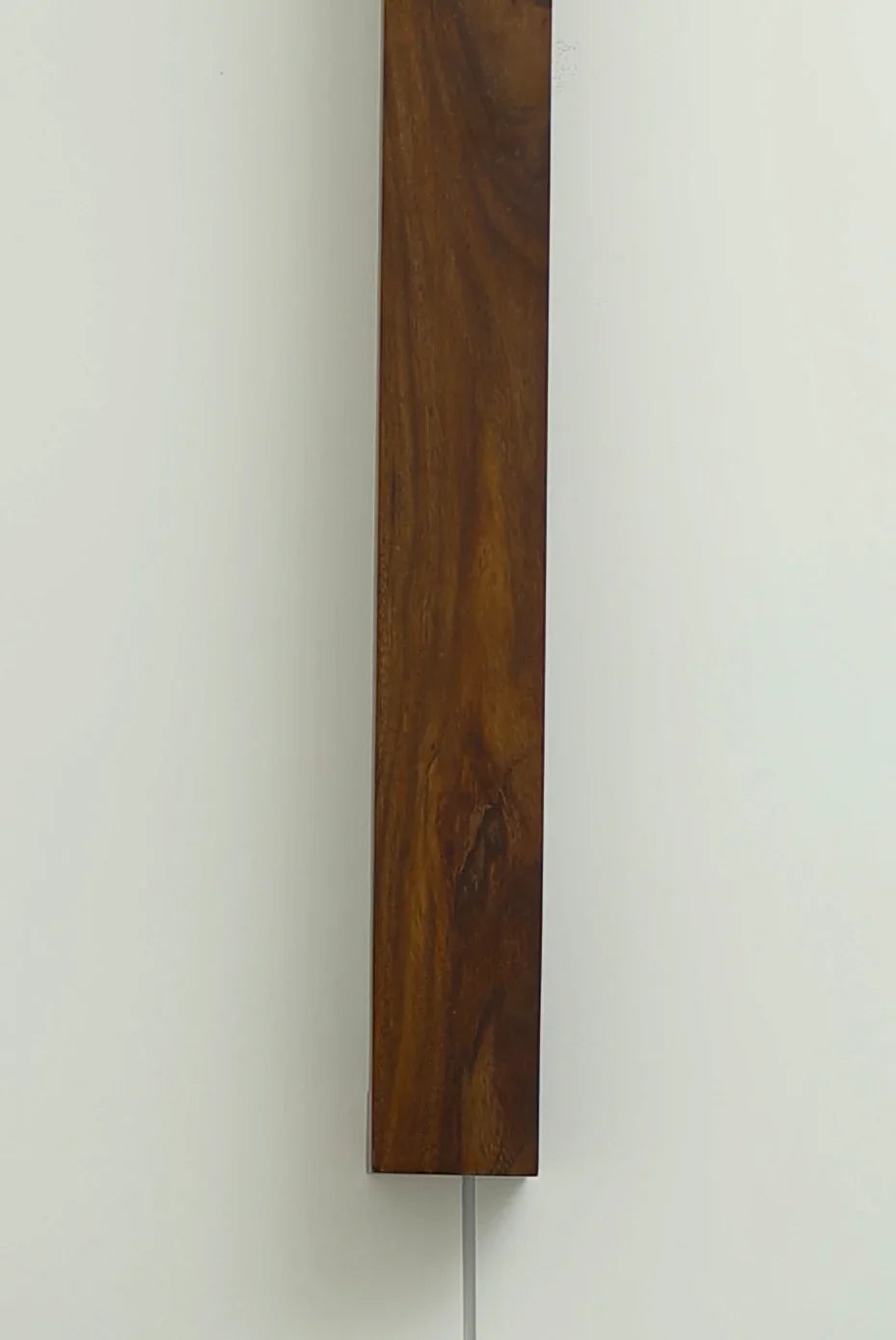 Nix Line dark wood vertical wall sconce shown against a plain background - NixWoods wall light