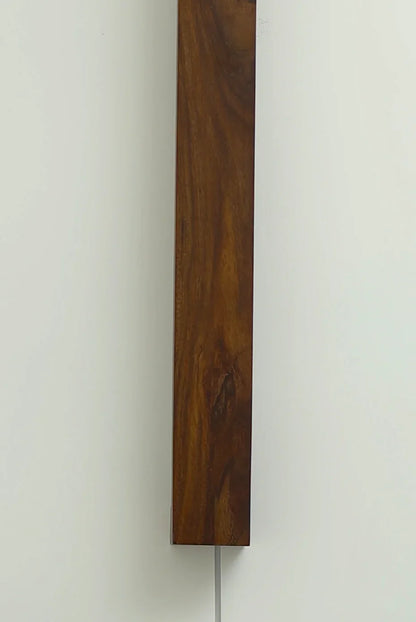 Nix Line dark wood vertical wall sconce shown against a plain background - NixWoods wall light