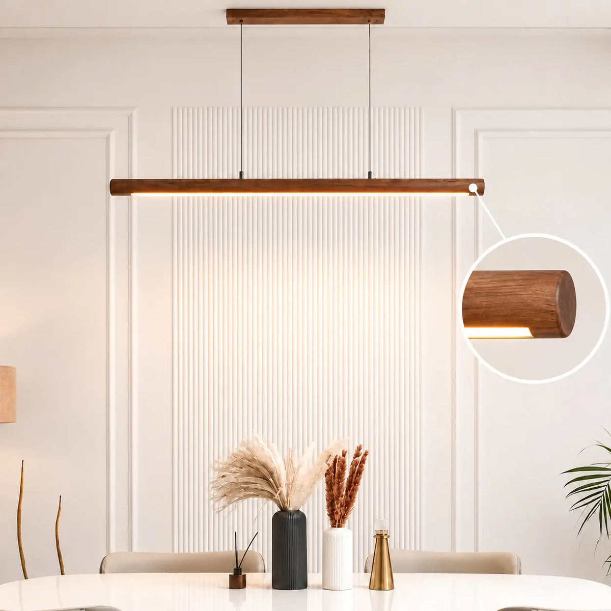 Scandinavian rosewood linear pendant over a dining table, rounded corner detail called out, NixWoods