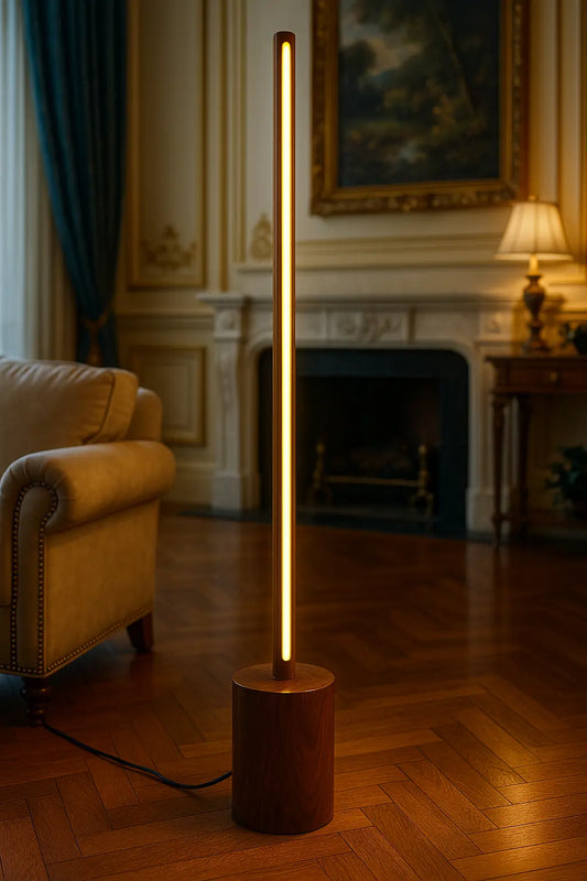 Two modern floor lamps with wooden bases in a room with beige curtains and sofa.

