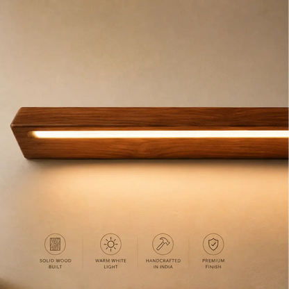 Timber teak wall light with feature icons: solid wood build, warm white light, handcrafted in India