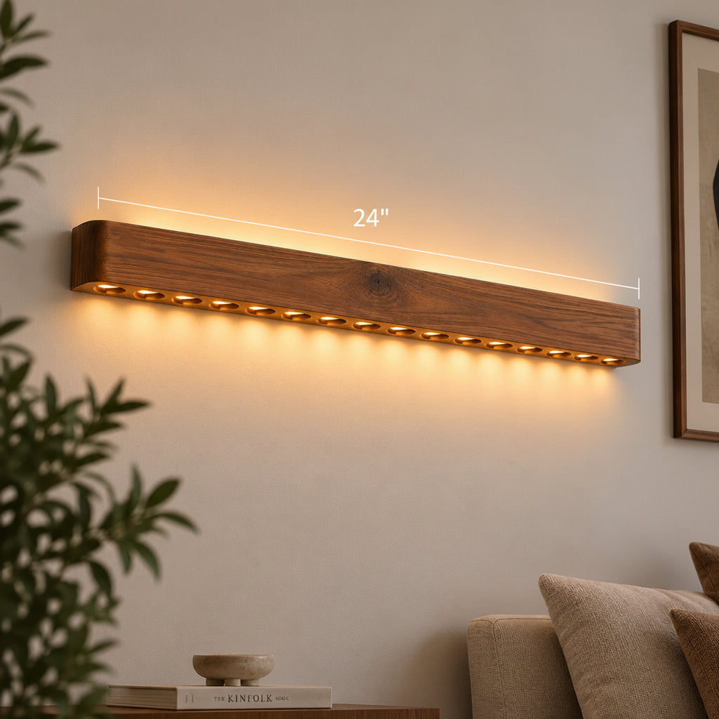 Circular-hole wooden wall light with its 24-inch length marked, warm LED dots above a sofa — NixWoods