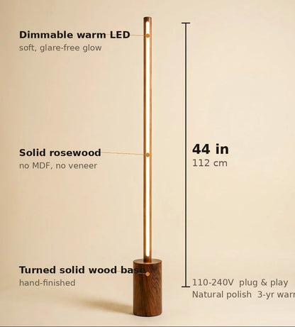 NixWoods solid rosewood floor lamp centered with 44 in / 112 cm measurement and key specs called out around it — dimmable warm LED, solid rosewood, turned wood base, 110–240V, 3-year warranty
