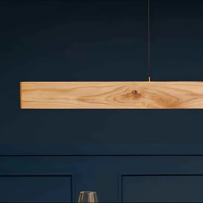 Close view of the pine wood pendant light bar and its grain - NixWoods linear hanging light