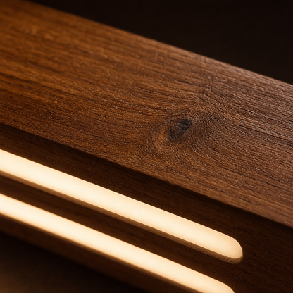 Macro close-up of the solid Sheesham wood grain and LED channel edge on the Duo Glow Wooden Wall Light